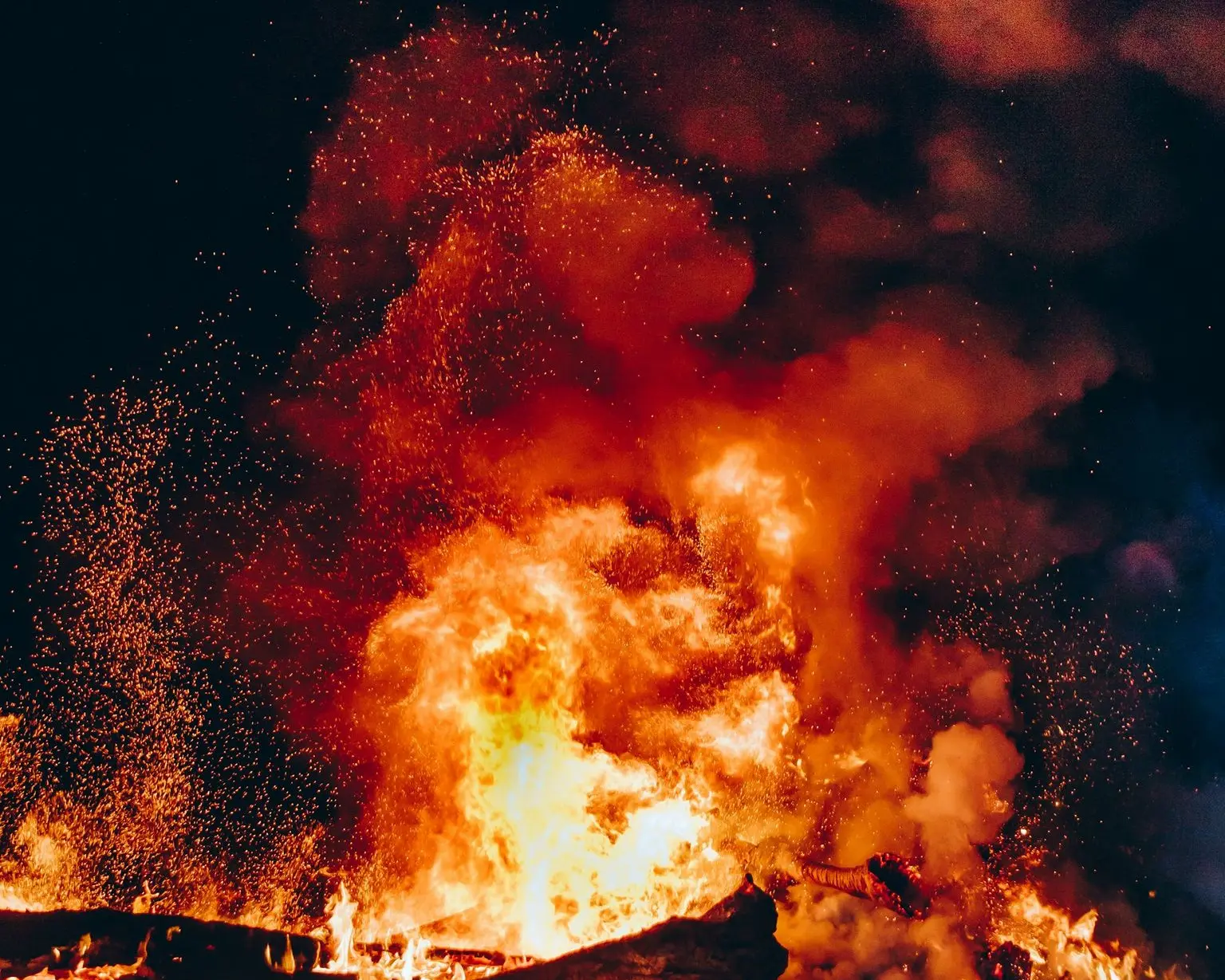 fire with black smoke during night