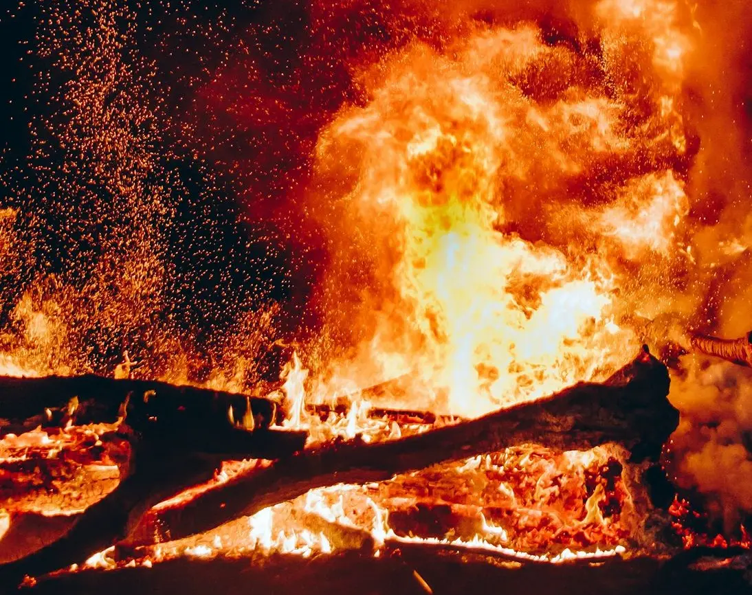 fire with black smoke during night